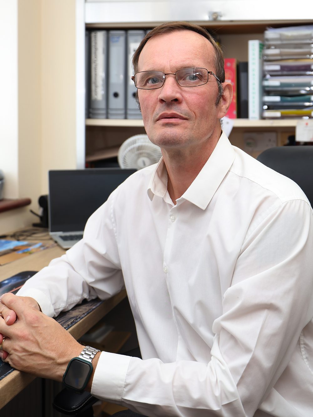 The Home Manager at his desk