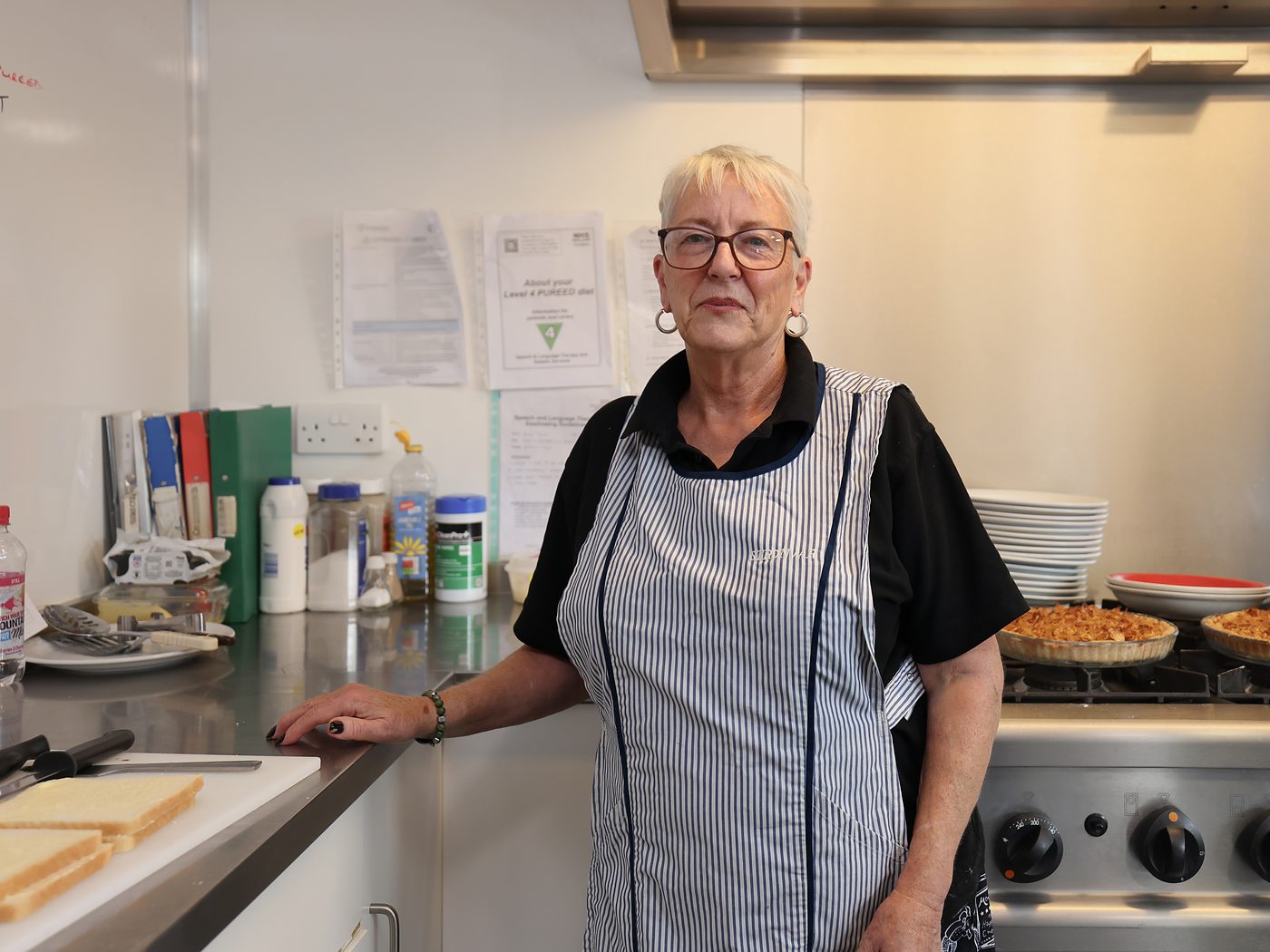 The Stronvar cook in the kitchen, fresh pies on the stove